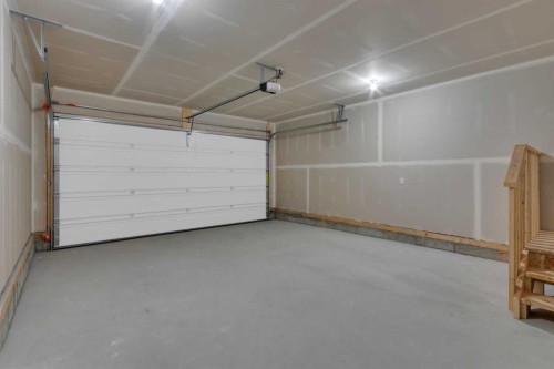 1325 South Point Parade Sw, Airdrie, AB - Indoor Photo Showing Garage