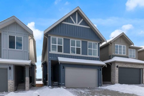 1325 South Point Parade Sw, Airdrie, AB - Outdoor With Facade