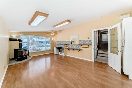 332 Wascana Crescent Se, Calgary, AB - Indoor With Fireplace