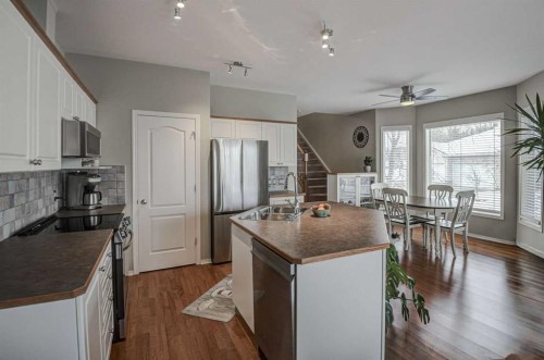 96 Hampstead Green Nw, Calgary, AB - Indoor Photo Showing Kitchen With Double Sink