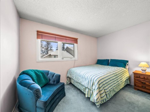 29 Millrise Lane Sw, Calgary, AB - Indoor Photo Showing Bedroom