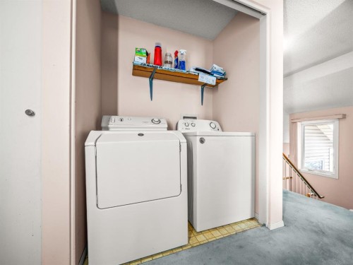 29 Millrise Lane Sw, Calgary, AB - Indoor Photo Showing Laundry Room