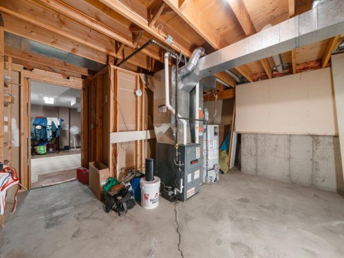 29 Millrise Lane Sw, Calgary, AB - Indoor Photo Showing Basement