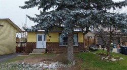 76 Coach Manor Rise SW Calgary, AB T3H 1C4