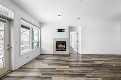 108-11642 Valley Ridge Park Nw, Calgary, AB - Indoor With Fireplace