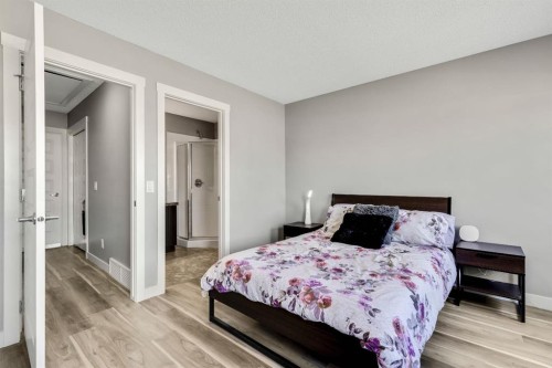 220 Mckenzie Towne Close Se, Calgary, AB - Indoor Photo Showing Bedroom