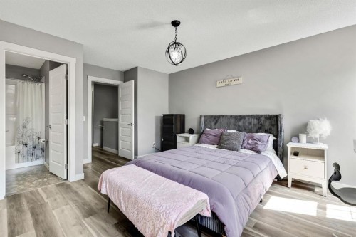220 Mckenzie Towne Close Se, Calgary, AB - Indoor Photo Showing Bedroom