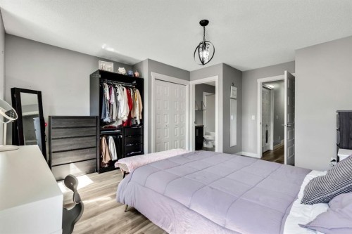 220 Mckenzie Towne Close Se, Calgary, AB - Indoor Photo Showing Bedroom