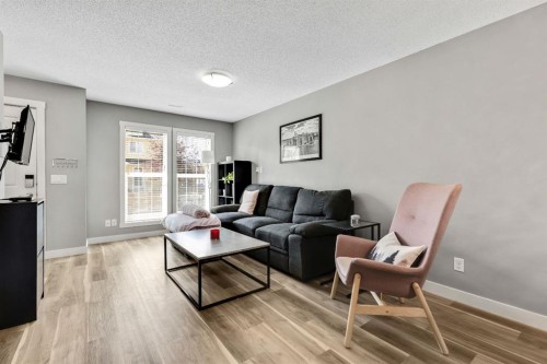 220 Mckenzie Towne Close Se, Calgary, AB - Indoor Photo Showing Living Room