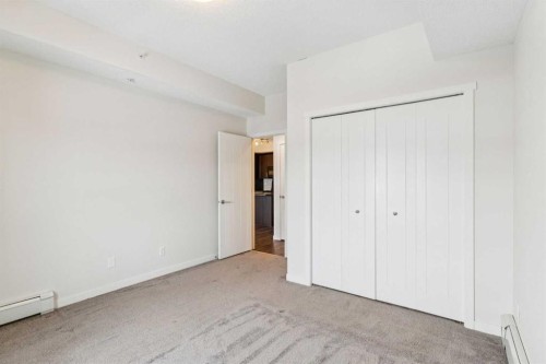 9312-101 Sunset Drive, Cochrane, AB - Indoor Photo Showing Other Room