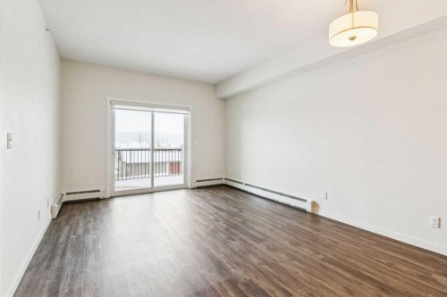 9312-101 Sunset Drive, Cochrane, AB - Indoor Photo Showing Other Room