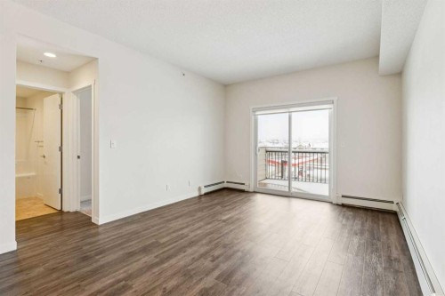 9312-101 Sunset Drive, Cochrane, AB - Indoor Photo Showing Other Room