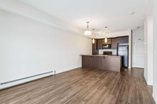 9312-101 Sunset Drive, Cochrane, AB - Indoor Photo Showing Kitchen