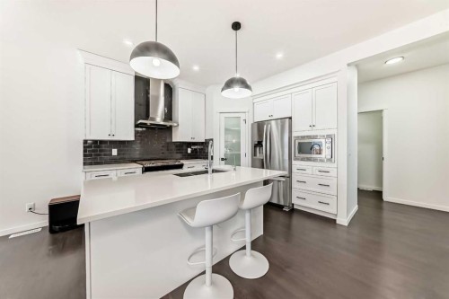 31 Creekside Grove Sw, Calgary, AB - Indoor Photo Showing Kitchen With Stainless Steel Kitchen With Upgraded Kitchen