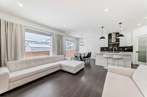 31 Creekside Grove Sw, Calgary, AB - Indoor Photo Showing Living Room