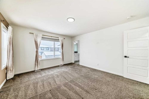 31 Creekside Grove Sw, Calgary, AB - Indoor Photo Showing Other Room