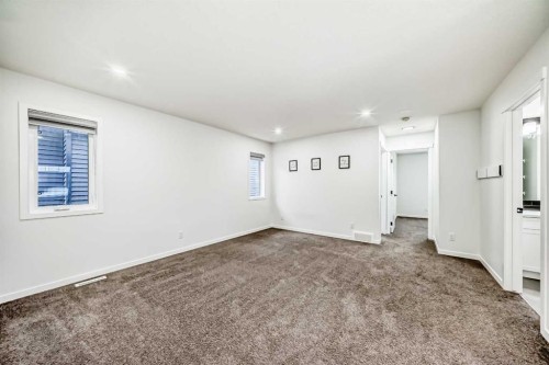 31 Creekside Grove Sw, Calgary, AB - Indoor Photo Showing Other Room