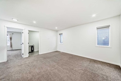 31 Creekside Grove Sw, Calgary, AB - Indoor Photo Showing Other Room