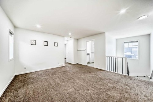 31 Creekside Grove Sw, Calgary, AB - Indoor Photo Showing Other Room