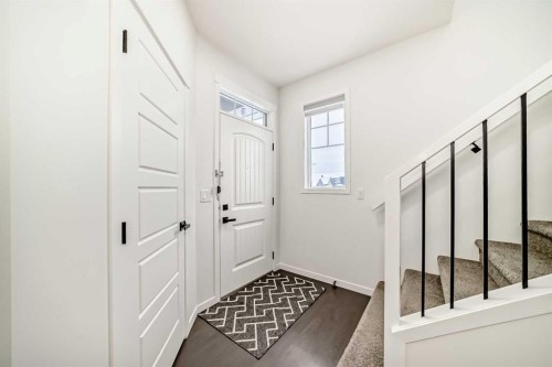 31 Creekside Grove Sw, Calgary, AB - Indoor Photo Showing Other Room