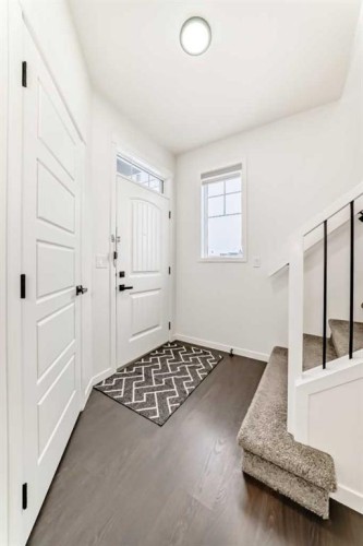 31 Creekside Grove Sw, Calgary, AB - Indoor Photo Showing Other Room