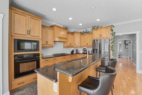 215 23 Avenue Ne, Calgary, AB - Indoor Photo Showing Kitchen With Stainless Steel Kitchen With Double Sink