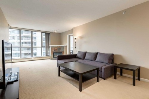 604-650 10 Street Sw, Calgary, AB - Indoor Photo Showing Living Room With Fireplace