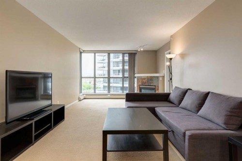 604-650 10 Street Sw, Calgary, AB - Indoor Photo Showing Living Room With Fireplace
