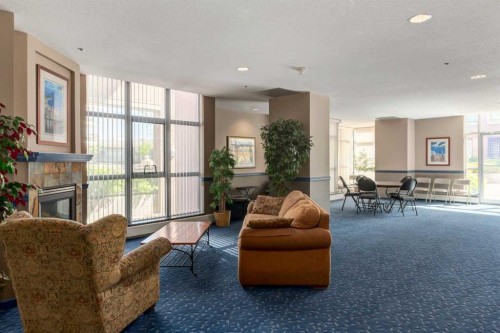 604-650 10 Street Sw, Calgary, AB - Indoor Photo Showing Living Room With Fireplace