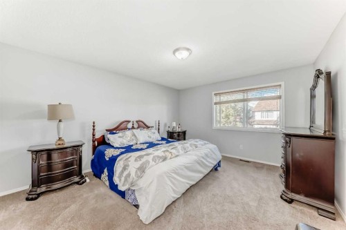 307 Panatella Court Nw, Calgary, AB - Indoor Photo Showing Bedroom