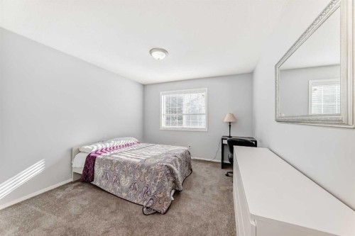 307 Panatella Court Nw, Calgary, AB - Indoor Photo Showing Bedroom