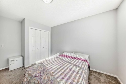 307 Panatella Court Nw, Calgary, AB - Indoor Photo Showing Bedroom