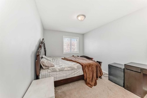307 Panatella Court Nw, Calgary, AB - Indoor Photo Showing Bedroom