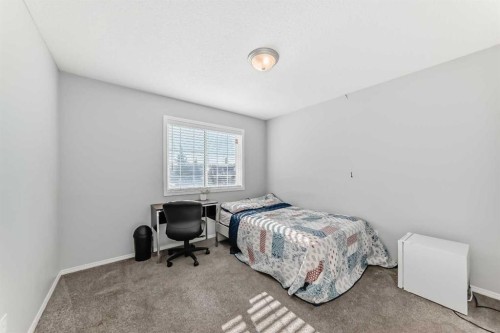 307 Panatella Court Nw, Calgary, AB - Indoor Photo Showing Bedroom