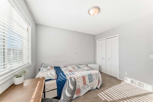 307 Panatella Court Nw, Calgary, AB - Indoor Photo Showing Bedroom