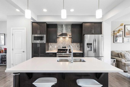 307 Walgrove Boulevard Se, Calgary, AB - Indoor Photo Showing Kitchen With Stainless Steel Kitchen With Double Sink With Upgraded Kitchen