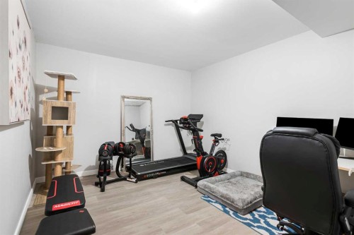 307 Walgrove Boulevard Se, Calgary, AB - Indoor Photo Showing Gym Room