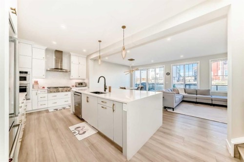 120 Magnolia Manor Se, Calgary, AB - Indoor Photo Showing Kitchen With Upgraded Kitchen