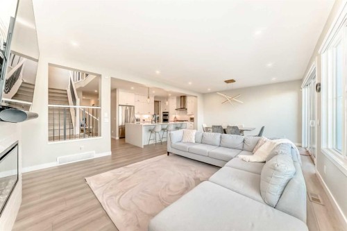 120 Magnolia Manor Se, Calgary, AB - Indoor Photo Showing Living Room
