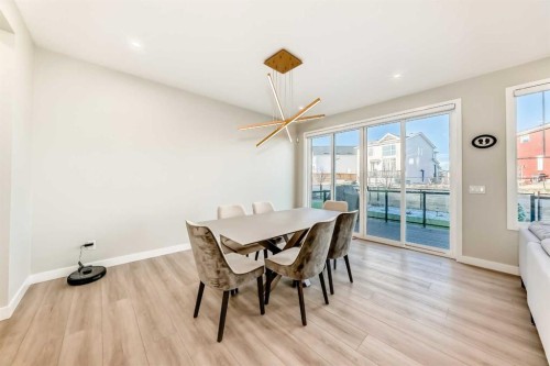120 Magnolia Manor Se, Calgary, AB - Indoor Photo Showing Dining Room