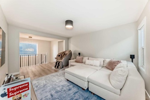 120 Magnolia Manor Se, Calgary, AB - Indoor Photo Showing Living Room