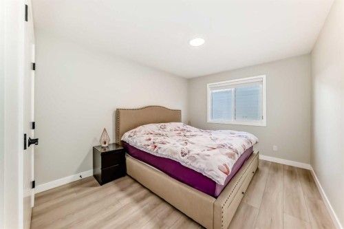 120 Magnolia Manor Se, Calgary, AB - Indoor Photo Showing Bedroom