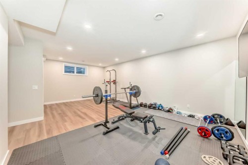 120 Magnolia Manor Se, Calgary, AB - Indoor Photo Showing Gym Room