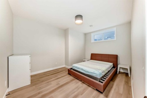 120 Magnolia Manor Se, Calgary, AB - Indoor Photo Showing Bedroom