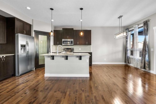 24 Panatella Square Nw, Calgary, AB - Indoor Photo Showing Kitchen With Upgraded Kitchen