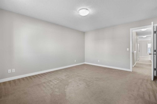 24 Panatella Square Nw, Calgary, AB - Indoor Photo Showing Other Room