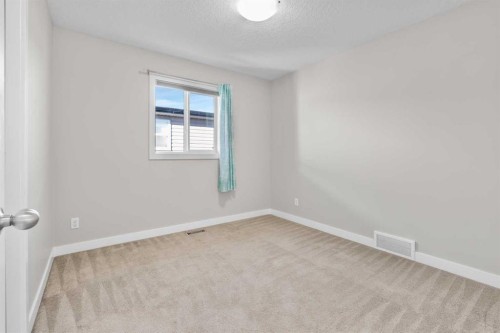24 Panatella Square Nw, Calgary, AB - Indoor Photo Showing Other Room