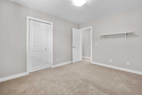 24 Panatella Square Nw, Calgary, AB - Indoor Photo Showing Other Room