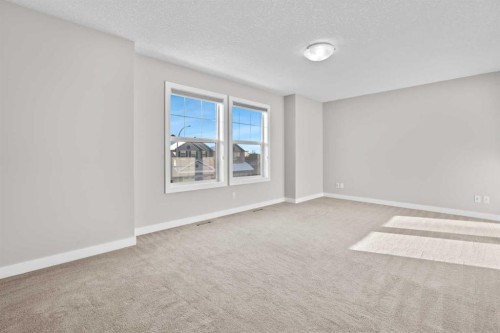 24 Panatella Square Nw, Calgary, AB - Indoor Photo Showing Other Room