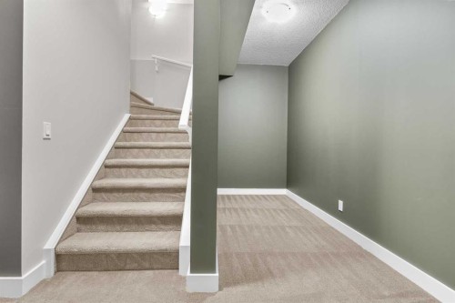 24 Panatella Square Nw, Calgary, AB - Indoor Photo Showing Other Room